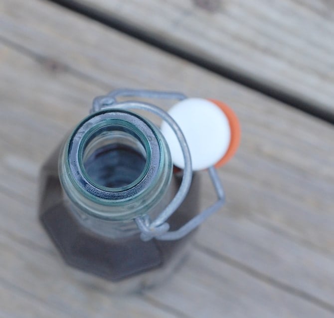 A Lavender Syrup for Your Coffee A Lavender Syrup bottle on a wooden table